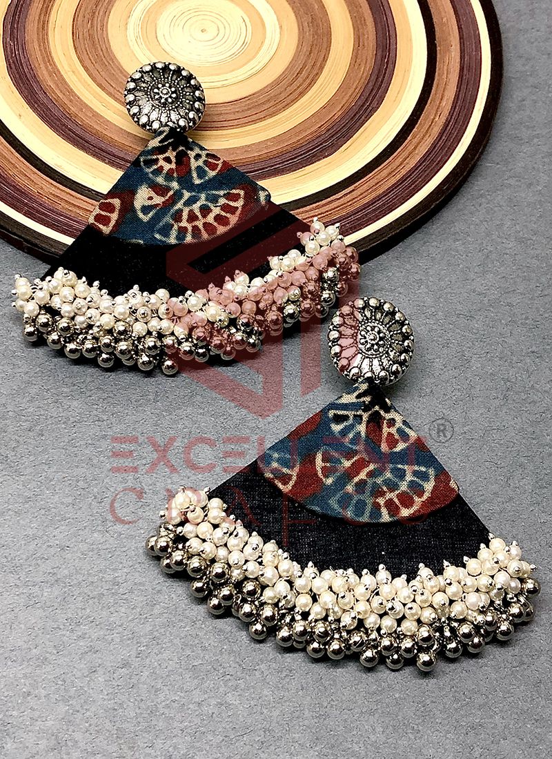 Kushal's Fashion Jewellery - Jhumka Earring with Peacock stud with Antique  Gold Polish and Ruby Green coloured stones and Pearl drops. #antique #pearl  #jewellery Design No: 81036rg Buy Online at:  https://www.kushals.com/collections/antique-earrings |