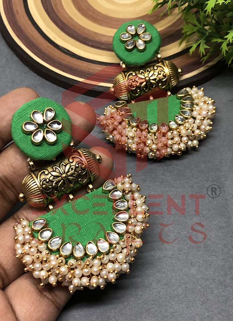 Light Pista green jhumka earrings in Reverse AD – Timeless desires  collection
