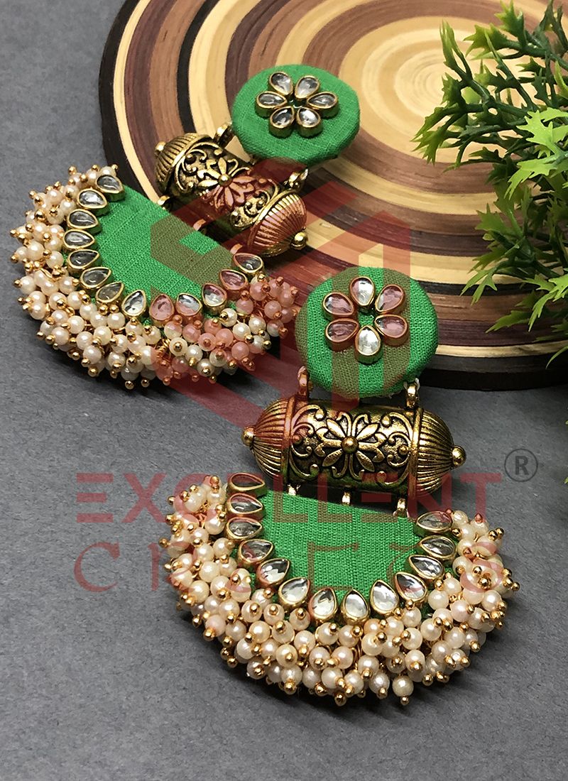 Green colour top ke earrings